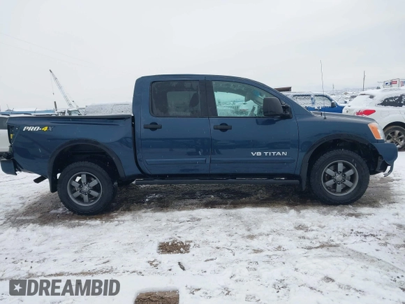 2015 Nissan Titan SV z VIN 1N6AA0ECXFN507260, wystawiony jako IAAI lot #41203612 z przebiegiem 103 000 mil mil oraz . Historia ofert i sprzedaży dostępna na DreamBid. Obrazek 13.