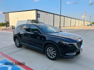 2019 Mazda CX-9 Touring z VIN JM3TCACY0K0320117, wystawiony jako Copart lot #57879005 z przebiegiem 44 144 mil mil oraz Czysty tytuł • Clean title. Historia ofert i sprzedaży dostępna na DreamBid. Obrazek 1.