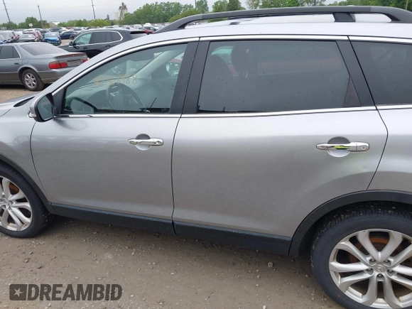 2012 Mazda CX-9 Grand Touring z VIN JM3TB3DA0C0337713, wystawiony jako IAAI lot #42368488 z przebiegiem 184 220 mil mil oraz . Historia ofert i sprzedaży dostępna na DreamBid. Obrazek 14.