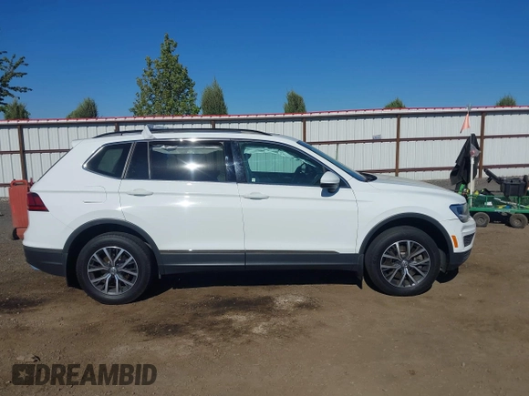 2020 Volkswagen Tiguan SE with VIN 3VV2B7AXXLM053170, listed as a IAAI auction lot 42203372 with 112,794 mi miles and . Bid and sale history available at DreamBid. Image 14.