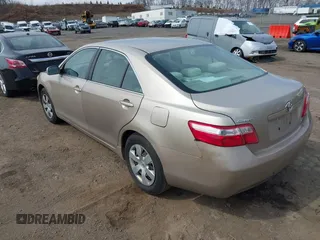 2009 Toyota Camry with VIN 4T1BE46K99U834926, listed as a IAAI auction lot 41853947 with 214,044 mi miles. Bid and sale history available at carsss.com. Image 3.