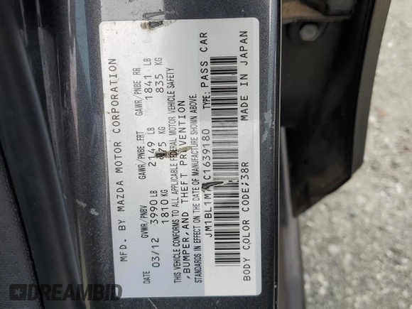 2012 Mazda 3 i Grand Touring с VIN JM1BL1M75C1639180, выставлен на аукционе Copart как лот 57331105 с пробегом 98 176 миль миль и Списание • Salvage title. История ставок и продаж доступна на DreamBid. Изображение 12.