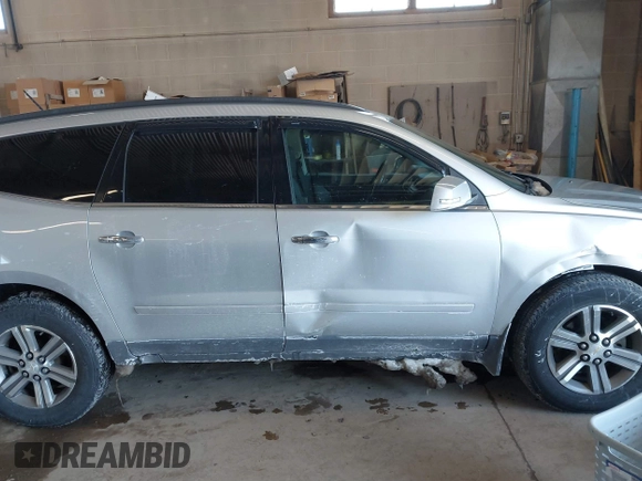 2015 Chevrolet Traverse LT with VIN 1GNKVHKD3FJ126405, listed as a IAAI auction lot 41597600 with 188,558 mi miles and . Bid and sale history available at DreamBid. Image 13.
