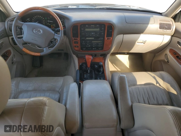 2001 Lexus LX 470 z VIN JTJHT00W213507042, wystawiony jako Copart lot #52634195 z przebiegiem 179 707 mil mil oraz Tytuł czysty. Historia ofert i sprzedaży dostępna na DreamBid. Obrazek 8.
