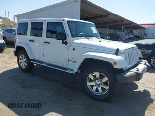 2015 Jeep Wrangler Unlimited Sahara with VIN 1C4BJWEG6FL504199, listed as a IAAI auction lot 42179591 with 69,342 mi miles and . Bid and sale history available at DreamBid. Image 1.