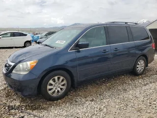 2009 Honda Odyssey EX-L with VIN 5FNRL38629B409446, listed as a Copart auction lot 54736045 with 176,229 mi miles and Salvage Title. Bid and sale history available at DreamBid. Image 1.