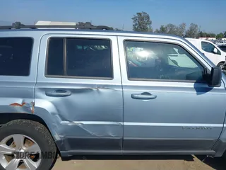 2013 Jeep Patriot Sport with VIN 1C4NJRBB8DD254107, listed as a IAAI auction lot 42170628 with 146,429 mi miles and . Bid and sale history available at carsss.com. Image 6.