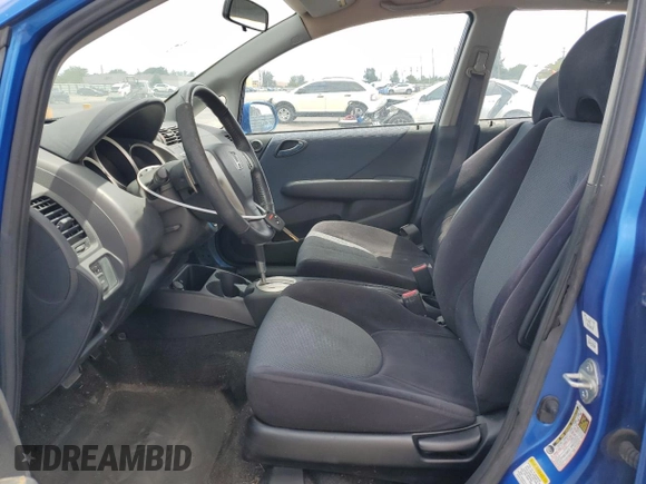 2007 Honda Fit Sport with VIN JHMGD38687S014318, listed as a Copart auction lot 53992935 with 59,504 mi miles and Clean title. Bid and sale history available at DreamBid. Image 7.