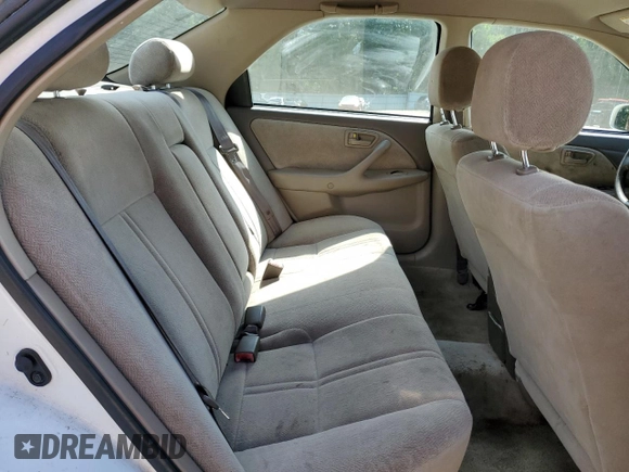 2001 Toyota Camry CE z VIN 4T1BG22K11U848960, wystawiony jako Copart lot #57259655 z przebiegiem 219 477 mil mil oraz Szkoda całkowita • Salvage title. Historia ofert i sprzedaży dostępna na DreamBid. Obrazek 10.