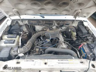 1998 Mazda B-Series 2WD Truck SX with VIN 4F4YR12C1WTM04588, listed as a IAAI auction lot 41563617 with 348,698 mi miles. Bid and sale history available at carsss.com. Image 10.