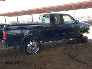 2000 Ford F-150 XL z VIN 1FTRX18L1YNA05567, wystawiony jako IAAI lot #42054536 z przebiegiem 245 018 mil mil oraz . Historia ofert i sprzedaży dostępna na DreamBid. Obrazek 4.