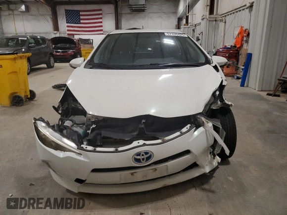 2014 Toyota Prius One z VIN JTDKDTB33E1558853, wystawiony jako Copart lot #57339425 z przebiegiem Nie podano mil oraz Nie do naprawy • Non repairable. Historia ofert i sprzedaży dostępna na DreamBid. Obrazek 5.