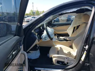 2018 BMW 5 Series 530e with VIN WBAJA9C50JB249995, listed as a IAAI auction lot 42301414 with 179,673 mi miles and . Bid and sale history available at DreamBid. Image 5.