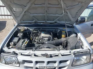 2001 Isuzu Rodeo S with VIN 4S2DM58WX14352481, listed as a IAAI auction lot 41796652 with 162,696 mi miles and . Bid and sale history available at DreamBid. Image 10.