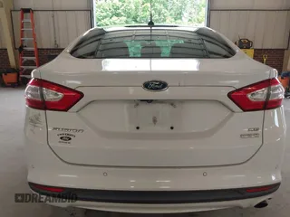 2014 Ford Fusion SE with VIN 3FA6P0HD8ER372731, listed as a IAAI auction lot 39915643 with 136,635 mi miles and . Bid and sale history available at DreamBid. Image 16.