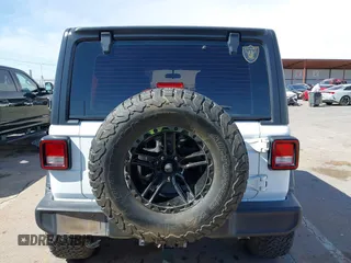 2020 Jeep Wrangler Unlimited Sport with VIN 1C4HJXDG0LW174393, listed as a IAAI auction lot 41575040 with 68,418 mi miles and . Bid and sale history available at DreamBid. Image 17.