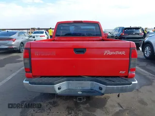 2000 Nissan Frontier XE z VIN 1N6DD21SXYC366427, wystawiony jako IAAI lot #42111404 z przebiegiem 176 579 mil mil oraz . Historia ofert i sprzedaży dostępna na DreamBid. Obrazek 17.