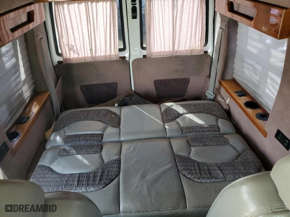 1999 Chevrolet Astro Cargo Van YF7 with VIN 1GBDM19WXXB133774, listed as a Copart auction lot 50024015 with 240,716 mi miles and Salvage Title. Bid and sale history available at carsss.com. Image 10.