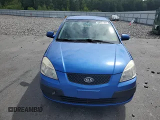 2009 Kia Rio LX with VIN KNADE223696530633, listed as a Copart auction lot 68371794 with 165,505 mi miles and Salvage Title. Bid and sale history available at carsss.com. Image 5.