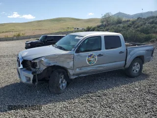 2015 Toyota Tacoma with VIN 3TMLU4EN2FM179631, listed as a Copart auction lot 57769855 with 106,288 mi miles and Salvage title. Bid and sale history available at DreamBid. Image 1.