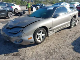 2000 Pontiac Firebird Firebird z VIN 2G2FS22K0Y2112410, wystawiony jako IAAI lot #41676541 z przebiegiem 129 857 mil mil oraz . Historia ofert i sprzedaży dostępna na DreamBid. Obrazek 17.