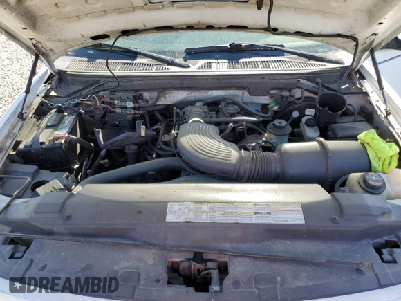 1997 Ford F-150 XL z VIN 1FTEX17L4VNC57714, wystawiony jako Copart lot #57499975 z przebiegiem 84 726 mil mil oraz Szkoda całkowita • Salvage title. Historia ofert i sprzedaży dostępna na DreamBid. Obrazek 11.