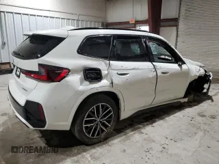 2023 BMW X1 xDrive28i with VIN WBX73EF08P5X60980, listed as a Copart auction lot 59899385 with 21,975 mi miles and Salvage title. Bid and sale history available at DreamBid. Image 3.