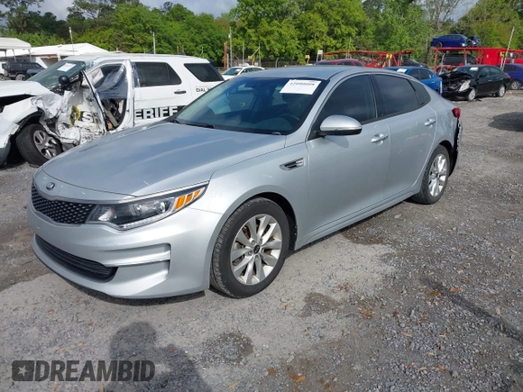 2018 Kia Optima EX with VIN 5XXGU4L34JG237557, listed as a IAAI auction lot 42000008 with 128,694 mi miles and . Bid and sale history available at carsss.com. Image 2.