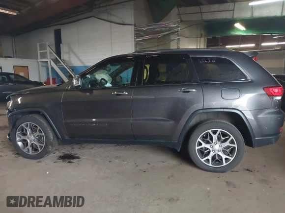 2021 Jeep Grand Cherokee 80th Anniversary z VIN 1C4RJFBG1MC831772, wystawiony jako IAAI lot #42227486 z przebiegiem 50 082 mil mil oraz . Historia ofert i sprzedaży dostępna na DreamBid. Obrazek 14.