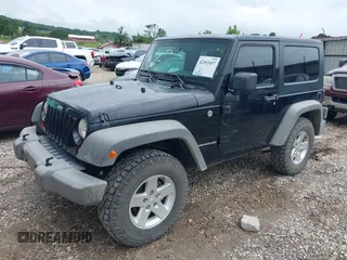 2007 Jeep Wrangler X with VIN 1J4FA24187L179428, listed as a IAAI auction lot 42492457 with 148,208 mi miles and . Bid and sale history available at DreamBid. Image 6.