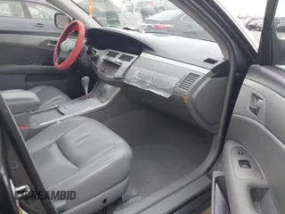 2009 Toyota Avalon XL with VIN 4T1BK36B59U350786, listed as a IAAI auction lot 41322151 with 222,128 mi miles and . Bid and sale history available at carsss.com. Image 5.
