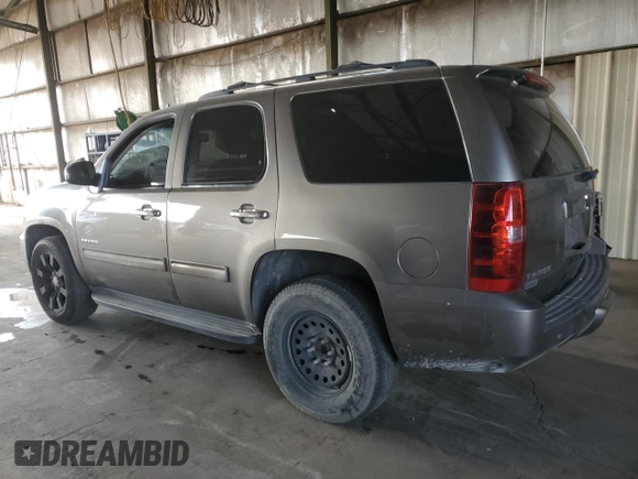 2014 Chevrolet Tahoe LT with VIN 1GNSCBE06ER245772, listed as a Copart auction lot 53747375 with 221,139 mi miles and Salvage title. Bid and sale history available at DreamBid. Image 2.