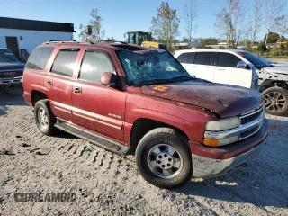 2002 Chevrolet Tahoe LS with VIN 1GNEC13Z12J290525, listed as a Copart auction lot 74580734 with 242,135 mi miles and Salvage Title. Bid and sale history available at carsss.com. Image 4.