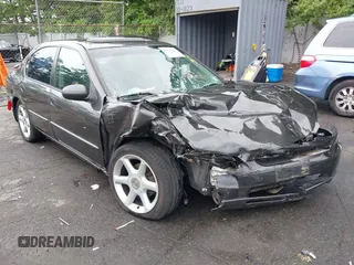 2000 Nissan Maxima GXE with VIN JN1CA31A3YT025913, listed as a IAAI auction lot 42635681 with 203,529 mi miles and . Bid and sale history available at DreamBid. Image 6.