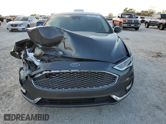 2019 Ford Fusion Hybrid Titanium with VIN 3FA6P0RU3KR138040, listed as a Copart auction lot 70843932 with 68,133 mi miles. Bid and sale history available at carsss.com. Image 5.