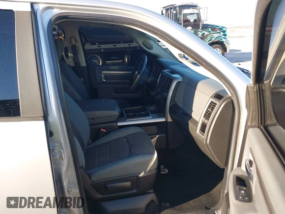 2014 Ram 1500 Big Horn with VIN 1C6RR6LT1ES180291, listed as a IAAI auction lot 40962366 with 131,763 mi miles and . Bid and sale history available at DreamBid. Image 5.
