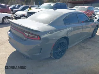2019 Dodge Charger R/T z VIN 2C3CDXCTXKH607784, wystawiony jako IAAI lot #41667401 z przebiegiem 120 644 mil mil oraz . Historia ofert i sprzedaży dostępna na DreamBid. Obrazek 4.