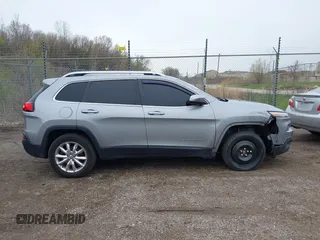 2014 Jeep Cherokee Limited z VIN 1C4PJMDB7EW197154, wystawiony jako IAAI lot #42079118 z przebiegiem 153 300 mil mil oraz . Historia ofert i sprzedaży dostępna na DreamBid. Obrazek 13.