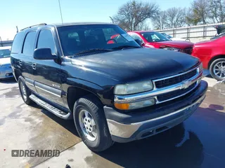 2003 Chevrolet Tahoe LS with VIN 1GNEC13V63R245581, listed as a IAAI auction lot 41599241 with 234,028 mi miles. Bid and sale history available at carsss.com. Image 1.