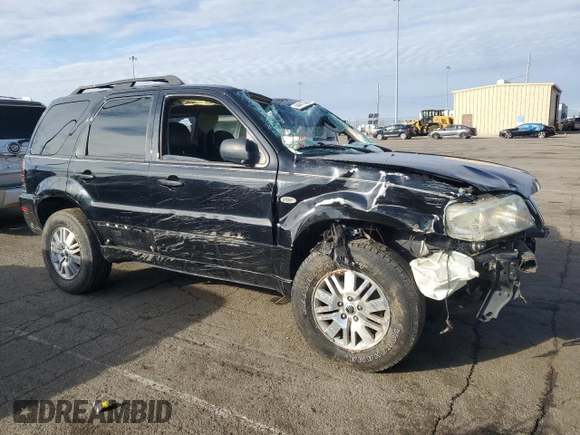 2005 Mercury Mariner Luxury z VIN 4M2CU57185DJ15517, wystawiony jako Copart lot #44415385 z przebiegiem 129 177 mil mil oraz Szkody całkowita. Historia ofert i sprzedaży dostępna na DreamBid. Obrazek 4.