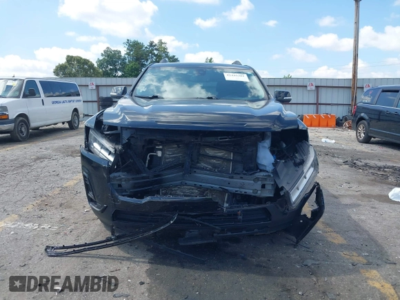 2021 GMC Acadia SLT with VIN 1GKKNMLS0MZ136228, listed as a IAAI auction lot 42445381 with 65,700 mi miles and . Bid and sale history available at DreamBid. Image 12.