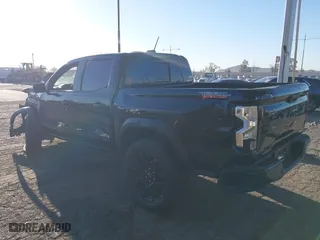 2024 Chevrolet Colorado 4WD Trail Boss with VIN 1GCPTEEK8R1137191, listed as a IAAI auction lot 41760382 with 27,068 mi miles. Bid and sale history available at carsss.com. Image 3.
