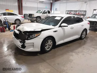 2016 Kia Optima LX with VIN KNAGT4L30G5072605, listed as a IAAI auction lot 41562330 with 152,320 mi miles. Bid and sale history available at carsss.com. Image 2.