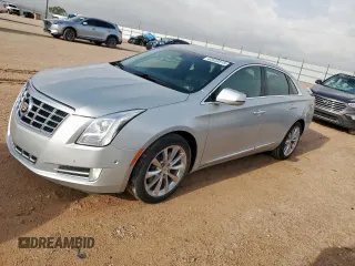 2014 Cadillac XTS Luxury with VIN 2G61M5S39E9260846, listed as a Copart auction lot 63433515 with 37,569 mi miles and Salvage title. Bid and sale history available at DreamBid. Image 1.