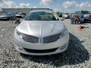 2013 Lincoln MKZ z VIN 3LN6L2G94DR820729, wystawiony jako Copart lot #53243145 z przebiegiem 111 753 mil mil oraz Szkoda całkowita • Salvage title. Historia ofert i sprzedaży dostępna na DreamBid. Obrazek 13.