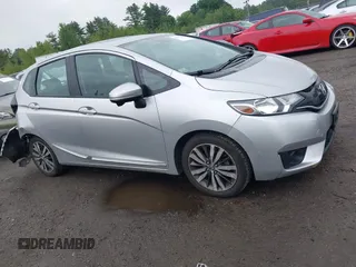 2015 Honda Fit EX-L z VIN 3HGGK5H82FM713988, wystawiony jako IAAI lot #42517762 z przebiegiem 56 169 mil mil oraz . Historia ofert i sprzedaży dostępna na DreamBid. Obrazek 13.