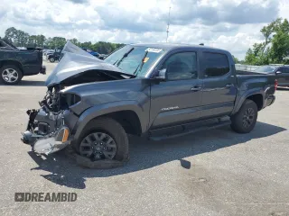 2023 Toyota Tacoma SR with VIN 3TMCZ5AN3PM627597, listed as a Copart auction lot 60196205 with 51,887 mi miles and Salvage title. Bid and sale history available at DreamBid. Image 1.