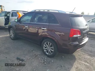 2011 Kia Sorento SX with VIN 5XYKW4A28BG127753, listed as a IAAI auction lot 42033754 with 163,470 mi miles. Bid and sale history available at carsss.com. Image 3.