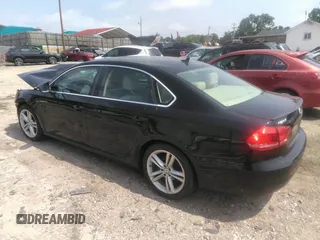 2012 Volkswagen Passat SE z VIN 1VWBN7A30CC073400, wystawiony jako IAAI lot #42284473 z przebiegiem 144 782 mil mil oraz . Historia ofert i sprzedaży dostępna na DreamBid. Obrazek 3.