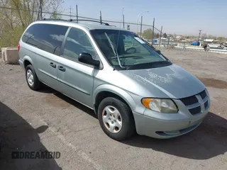 2003 Dodge Caravan SE with VIN 1D4GP24353B138297, listed as a IAAI auction lot 41763796 with 247,447 mi miles. Bid and sale history available at carsss.com. Image 1.